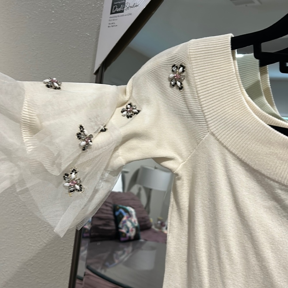 Gorgeous white sweater with tiered tule sleeves and butterfly beads.